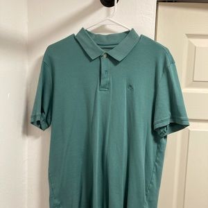 Green polo shirt by Bass in like new condition